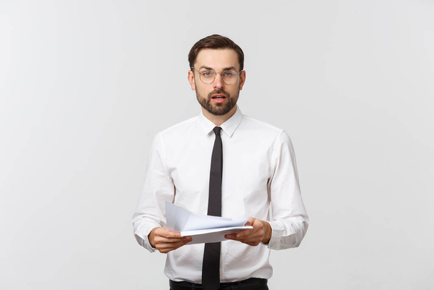 young business man serious writing on clipboard, Handsome businessman wear elegant suit and tie isolated over white background. - Foto, afbeelding