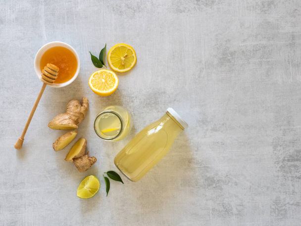 Antiviral drink with lemon, honey and ginger root, strengthening of immunity concept - Photo, Image