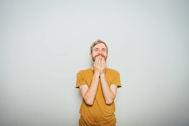 man laughs and covers her mouth - Photo, image