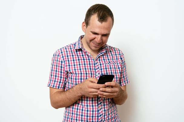 A man with a smartphone - Photo, image