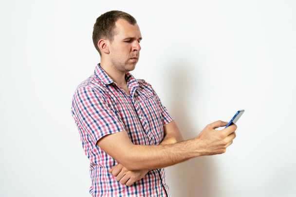 A man with a smartphone - Фото, изображение