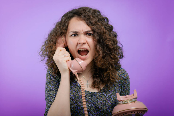 Portrait of a woman yelling at phone - Фото, изображение