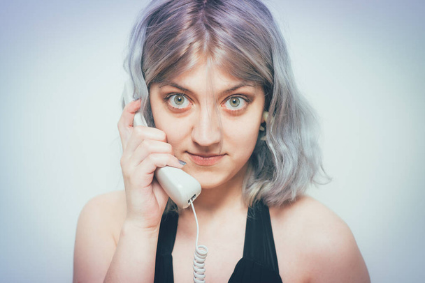 Woman Talking On Landline Telephone, Indoors - Fotó, kép