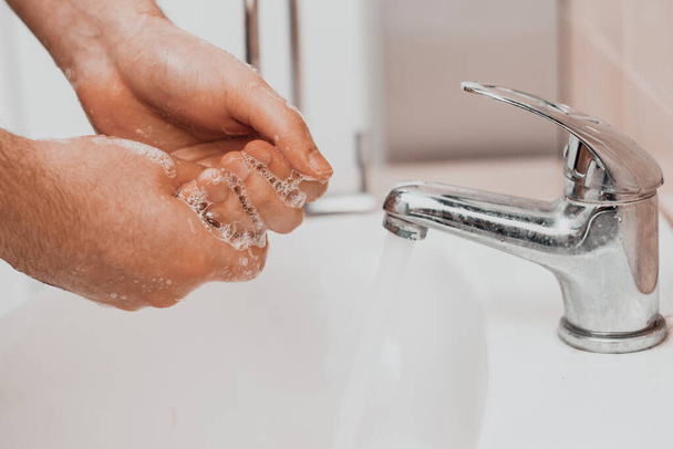 Washing hands rubbing with soap man for corona virus prevention, hygiene to stop spreading coronavirus. - Photo, Image