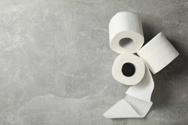 Toilet paper on grey background, space for text - Photo, Image