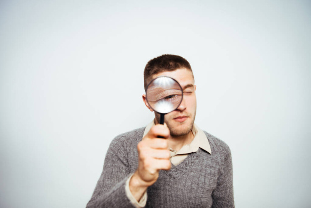 The man with a magnifier - Photo, Image
