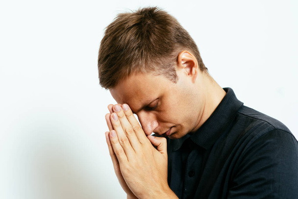 Prayer. Man. in photo studio - Foto, immagini