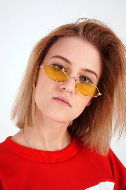 Vertical portrait - girl in yellow glasses - Photo, Image