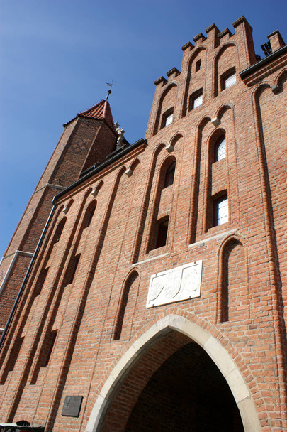 clock tower in a historic brick building in Poland train station - Valokuva, kuva