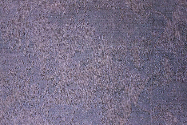 Een kalme grijze textuur zonder patroon. Paarse toning. Oppervlakte van de muur, interieur afwerking. Daglicht. - Foto, afbeelding