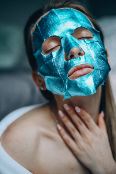 Blue face mask treatment - Φωτογραφία, εικόνα