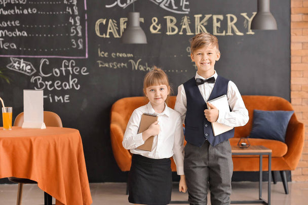Cute little waiters in restaurant - Photo, Image