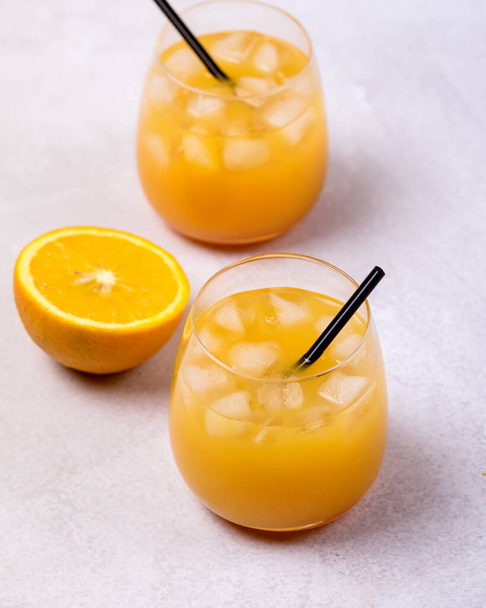Close Up Glass of Tasty Orange Juice Healthy Diet Detox Beverage Vitamin Light Gray Background Vertical - Foto, Bild