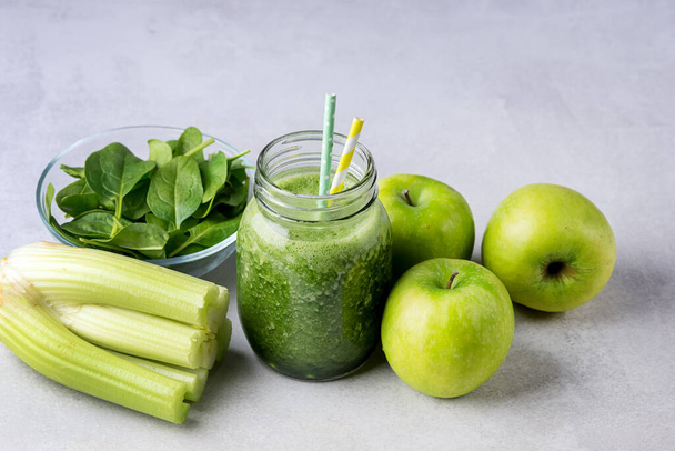Glass Jar of Healthy Green Smoothie Detox Drink wirh Green Apple Celery and Raw Spinach Diet Beverage Horizontal - Zdjęcie, obraz