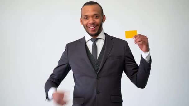 African-american Businessman holding Credit or debit bank Card - Video