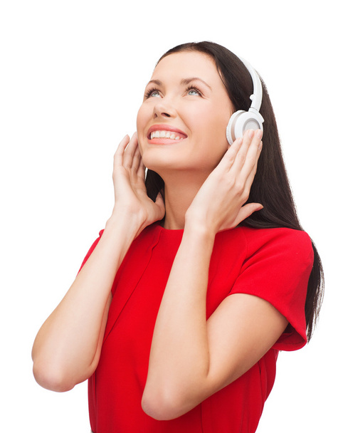 Smiling woman with headphones - Foto, Imagen