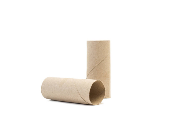 Zentrum einer Toilettenpapierrolle ohne Papier auf weißem Hintergrund - Foto, Bild