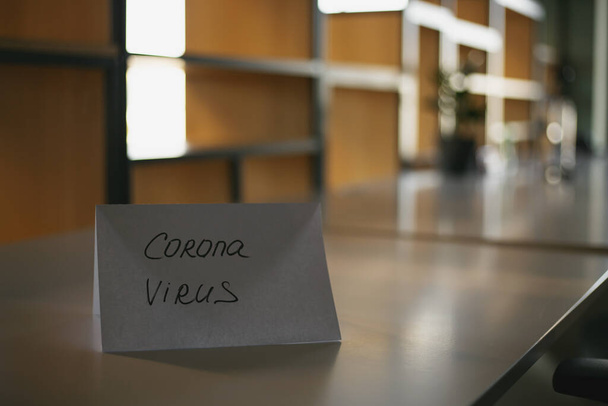Closed office due to quarantine. Covid-19. Corona Virus. Empty Workplace. - Photo, Image