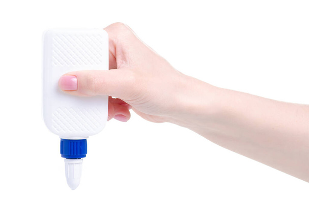 White bottle glue in hand - Foto, afbeelding