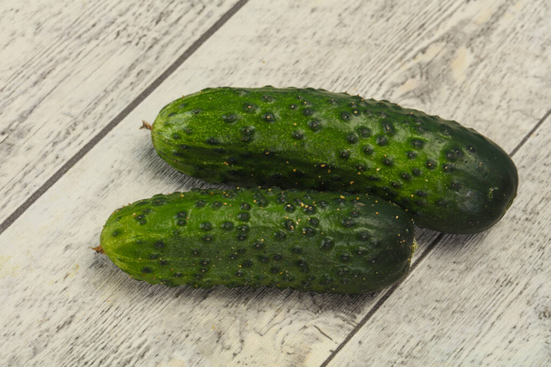Ripe fresh green two cucumbers ready for vegan - Photo, Image