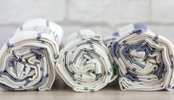 Rolled up white striped linen towels, clean towels - Photo, Image