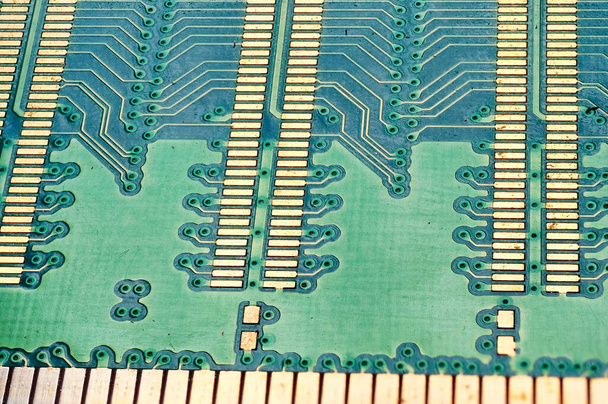 Крупним планом електронні компоненти на материнській платі, мікропроцесорний чип
 - Фото, зображення