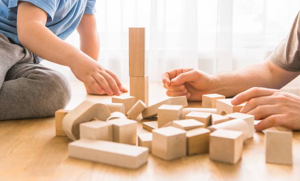 Young dad play with building bricks with small son - Fotoğraf, Görsel