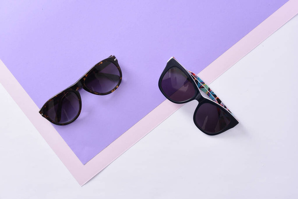 sunglasses eyewear on pastel color paper background  - Photo, Image