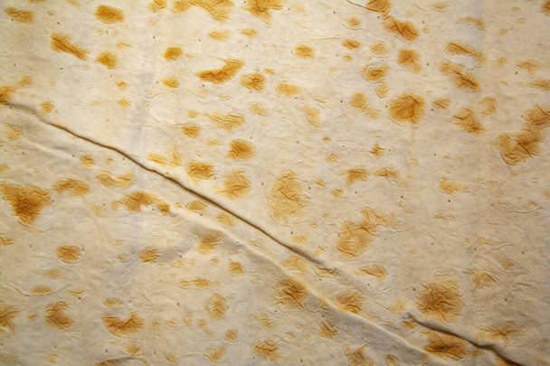 Textured surface of thin Armenian lavash. Traditional flour and water tortilla - Photo, Image