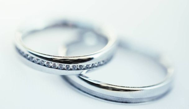 Close up of very expensive wedding rings for newlyweds, wedding concept, macro image - Photo, Image