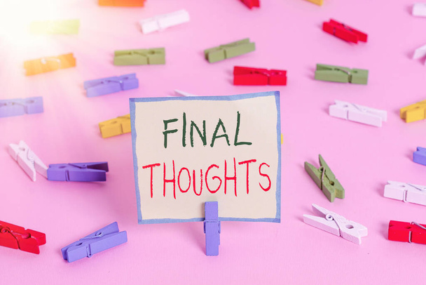 Text sign showing Final Thoughts. Conceptual photo the conclusion or last few sentences within your conclusion Colored clothespin papers empty reminder pink floor background office pin. - Photo, Image