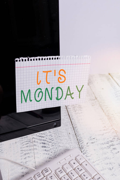 Conceptual hand writing showing Its Monday. Business photo showcasing welcoming the first day of the week with positive outlook Notation paper computer monitor screen near white keyboard. - Photo, Image