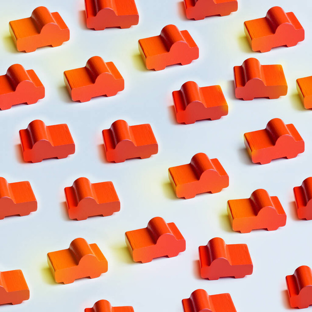 Foto oranje houten speelgoed auto grote naadloze patroon - Foto, afbeelding