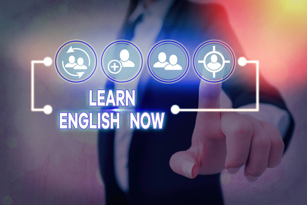 Conceptual hand writing showing Learn English Now. Business photo showcasing gain or acquire knowledge and skill of english language. - Photo, Image