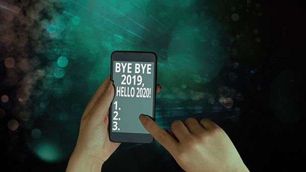 Tekst pisma Bye Bye 2020 Hello 2020. Pojęcie to oznacza pożegnanie się z ubiegłym rokiem i przyjęcie kolejnego.. - Zdjęcie, obraz