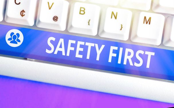 Conceptual hand writing showing Safety First. Business photo showcasing used to say that the most important thing is to be safe. - Photo, Image
