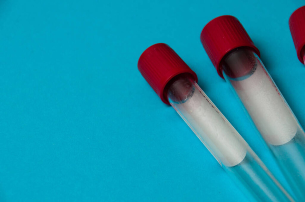Coronavirus medicine and treatment concept. Blood test tubes at the end of detecting new outbreaks of corona virus - Φωτογραφία, εικόνα