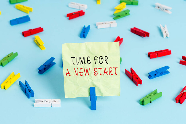 Writing note showing Time For A New Start. Business photo showcasing something is supposed to begin right now Fresh job Colored clothespin papers empty reminder blue floor officepin. - Photo, Image