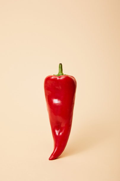 fresh red hot chili pepper on beige with copy space  - Zdjęcie, obraz