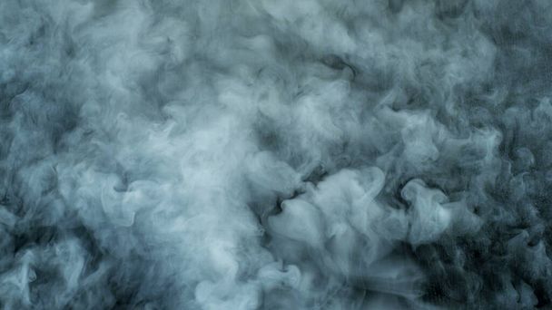 Photo of Realistic Clouds, fog, fume, haze, mist, vapor, smoke, dry ice smoke on black dark Background. Poster, Wallpaper, Texture, Banner, Still design. - Foto, afbeelding