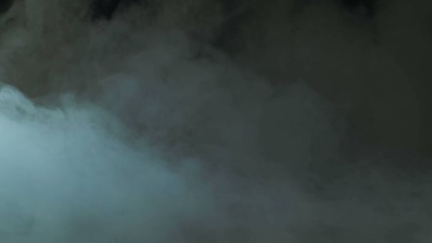 Photo of Real Smoke on a black background - realistic overlay for different projects. Clouds fog, mist, haze, vapor. - Photo, Image
