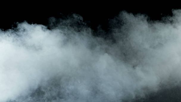 Foto de Real Smoke sobre fondo negro: superposición realista para diferentes proyectos. Nubes niebla, niebla, neblina, vapor
. - Foto, Imagen