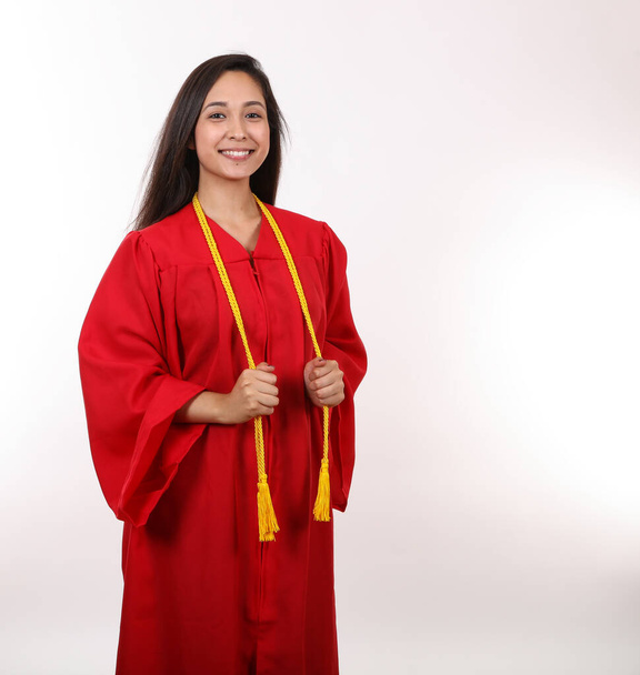 A young latina is ready to graduate. - Zdjęcie, obraz