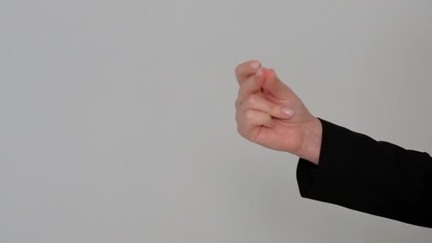 gesto dedo de um homem europeu sobre fundo branco
 - Filmagem, Vídeo