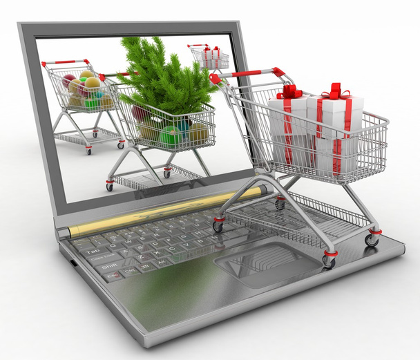Konzept des Weihnachts-Online-Shopping. Laptop mit festlichen Einkaufswagen - Foto, Bild