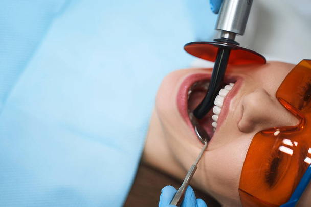 Woman is getting root canal stock photo - Photo, image