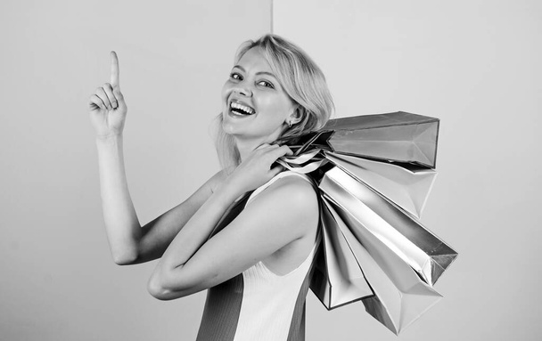 Shopping happiness. present packages for holiday preparation. summer discount. special offer on black friday. shop closeout. happy woman shopper. big sale. female shopaholic hold shopping bags - Foto, Imagen