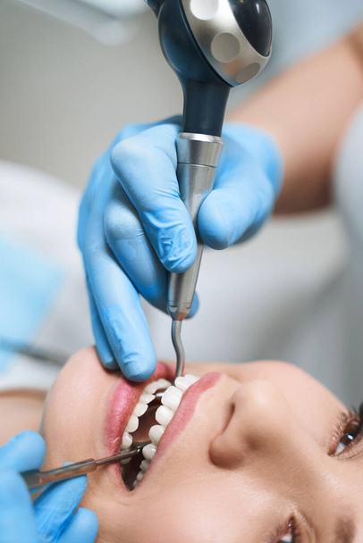 Pretty lady treating root canal stock photo - Photo, image