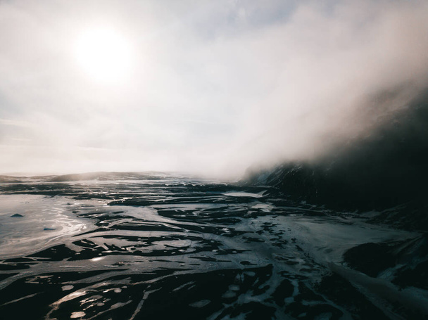 Dyrfjoll mountain covered in fog and mist, Iceland. - Фото, зображення