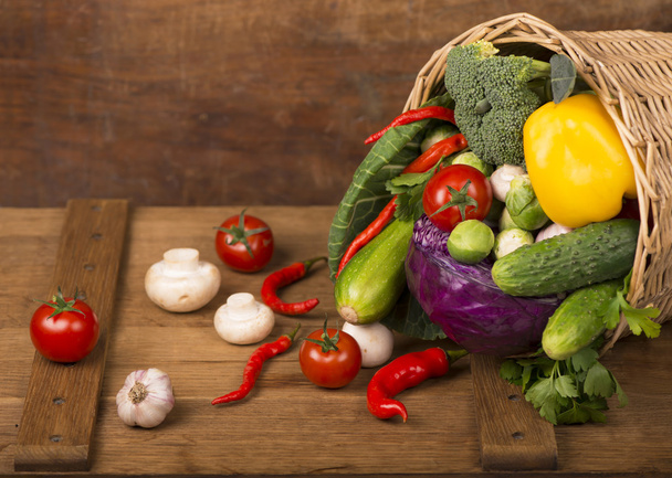 Healthy Organic Vegetables on a Wooden Background - Photo, Image